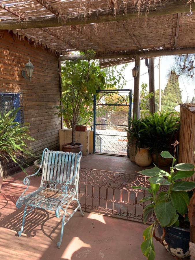בית האבן העתיק מ-1885 עם מגונית פרטית בחצר Rosh Pinna Exterior foto