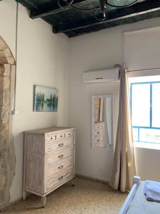 בית האבן העתיק מ-1885 עם מגונית פרטית בחצר Rosh Pinna Exterior foto